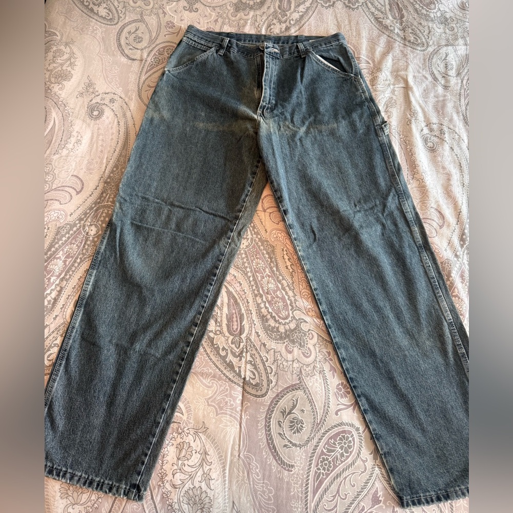 Well, worn wrangler Carpenter Jeans